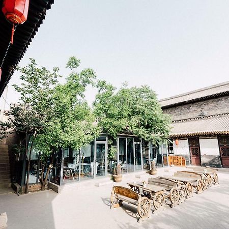 Fly By Knight Pingyao Courtyard Hotel Bagian luar foto