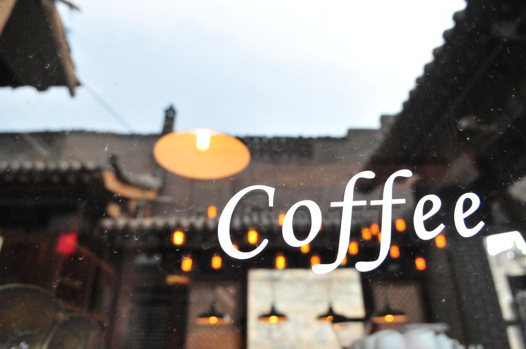 Fly By Knight Pingyao Courtyard Hotel Bagian luar foto