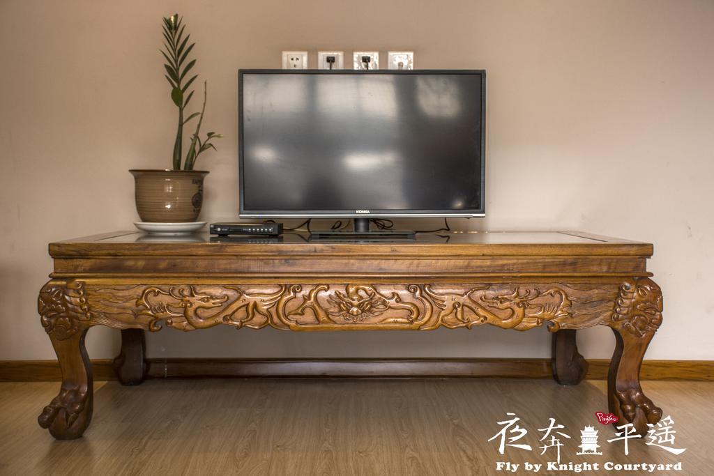 Fly By Knight Pingyao Courtyard Hotel Bagian luar foto