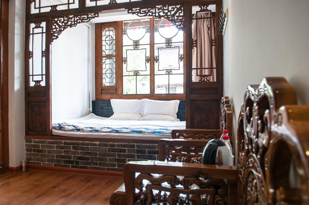Fly By Knight Pingyao Courtyard Hotel Bagian luar foto