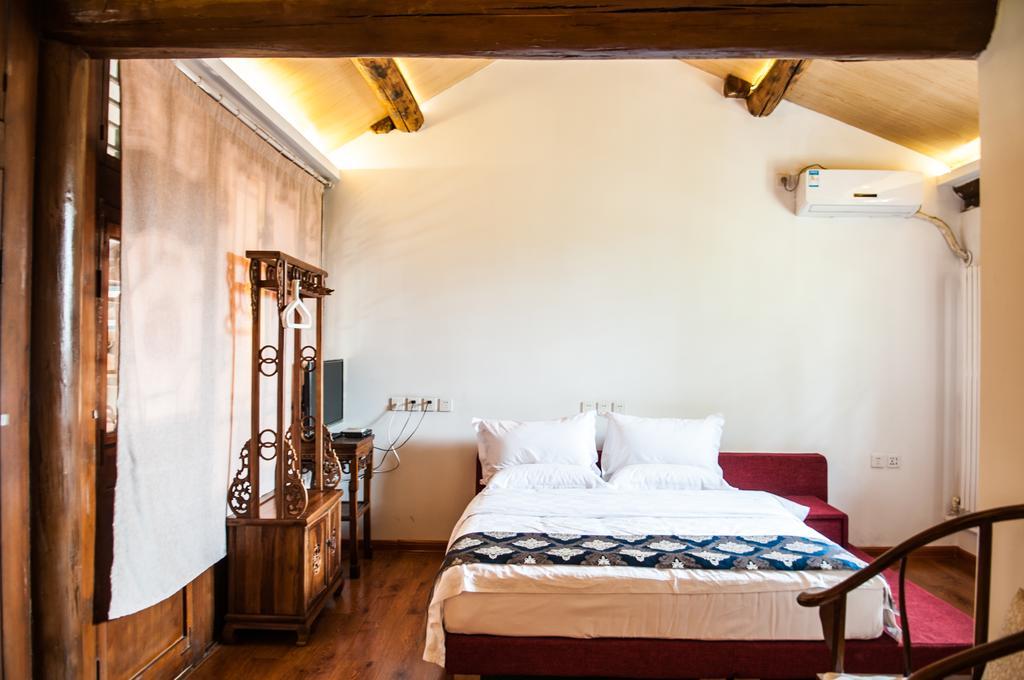Fly By Knight Pingyao Courtyard Hotel Bagian luar foto