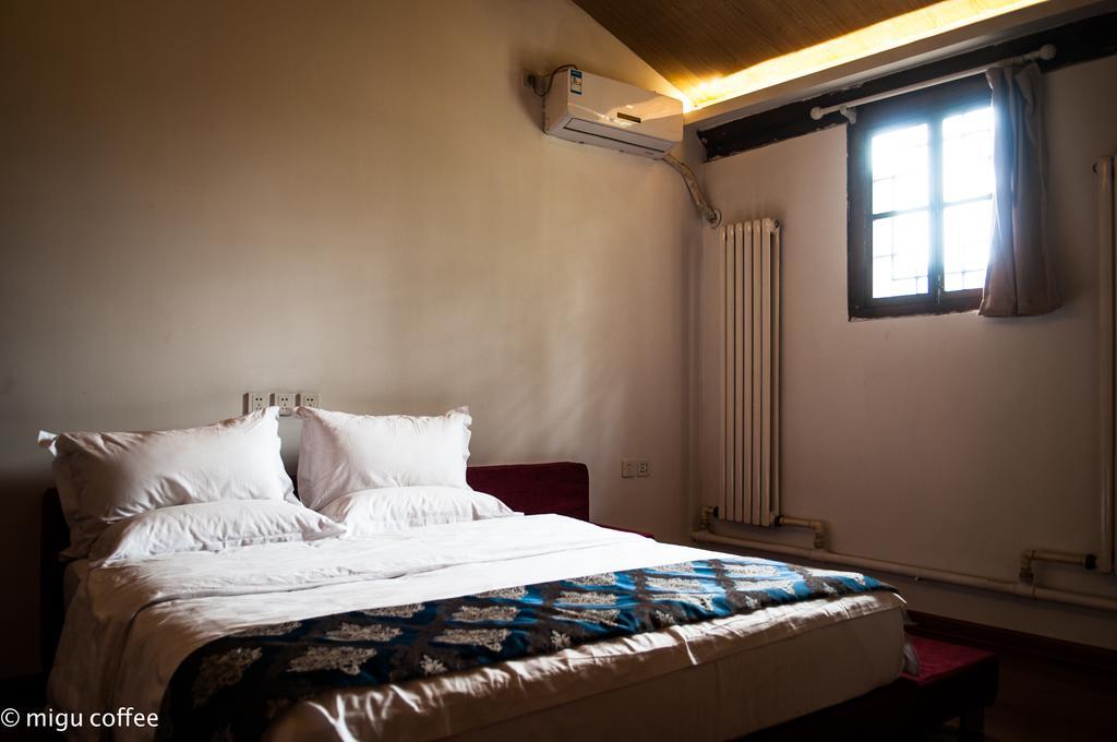 Fly By Knight Pingyao Courtyard Hotel Bagian luar foto