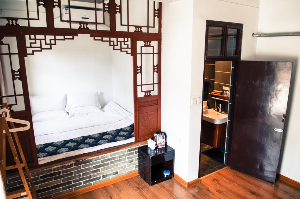 Fly By Knight Pingyao Courtyard Hotel Bagian luar foto