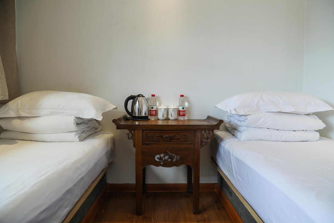 Fly By Knight Pingyao Courtyard Hotel Bagian luar foto